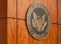 U.S. SEC’s Piwowar Urges Companies to Pursue Mandatory Arbitration Clauses